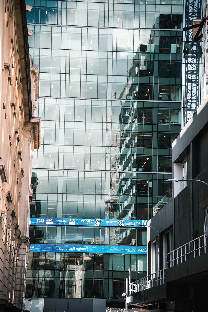 office building clear glass paneled high rise building architecture